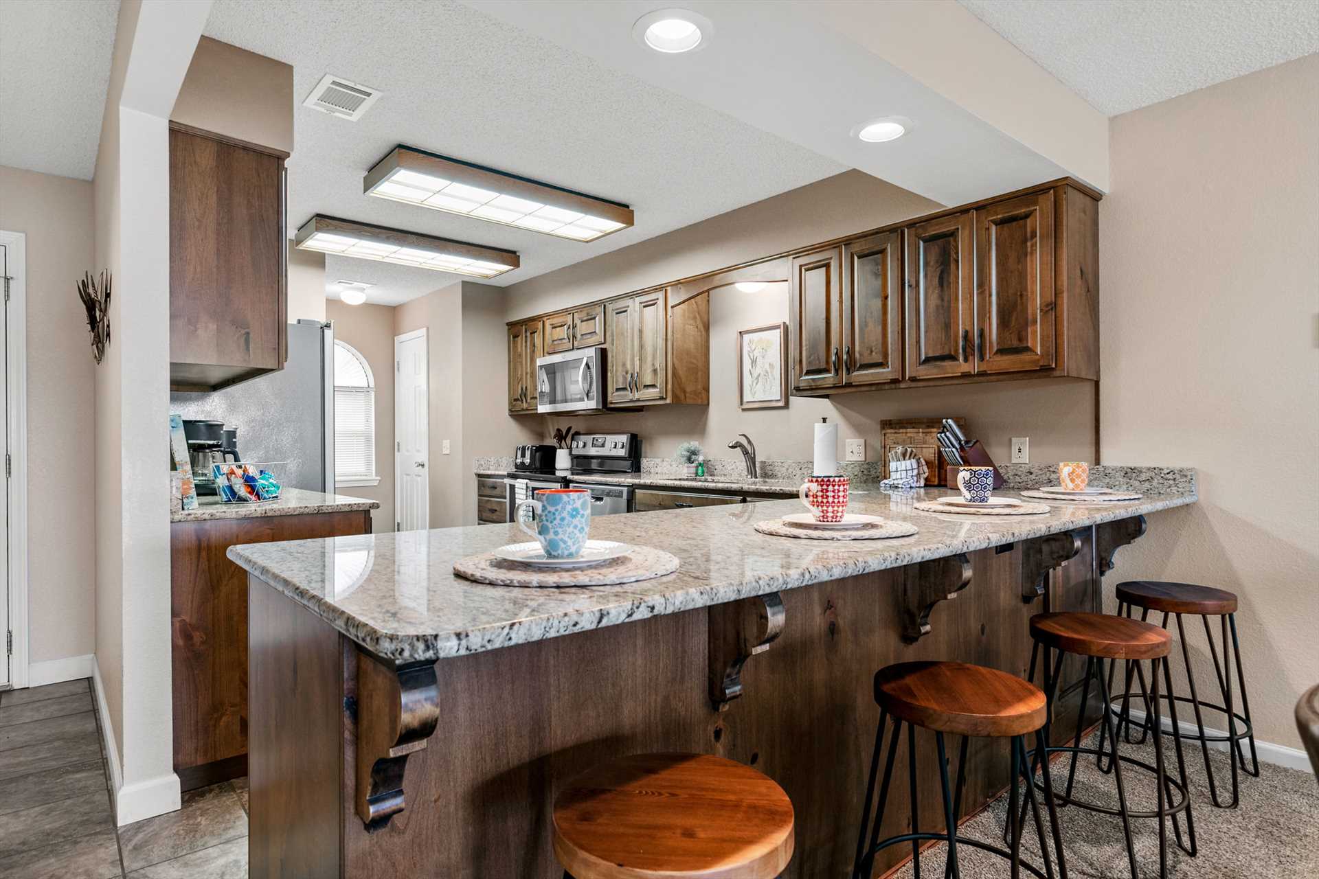 The spacious kitchen has many upgrades.